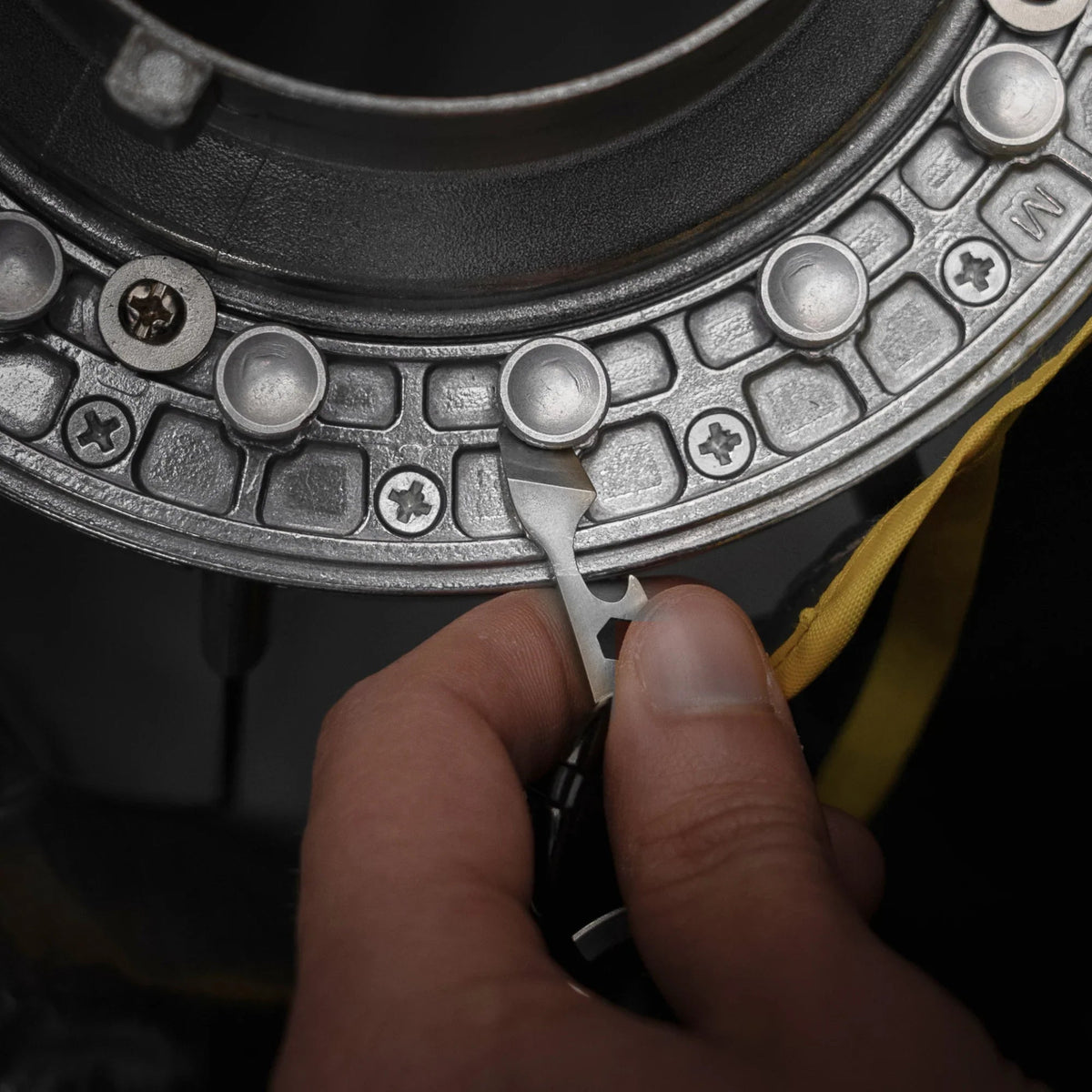 Compact metal multitool adjusting industrial gear, Gear Carry everyday carry accessory.