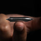 Compact stainless steel pen balanced on fingertip, Gear Carry everyday carry accessory