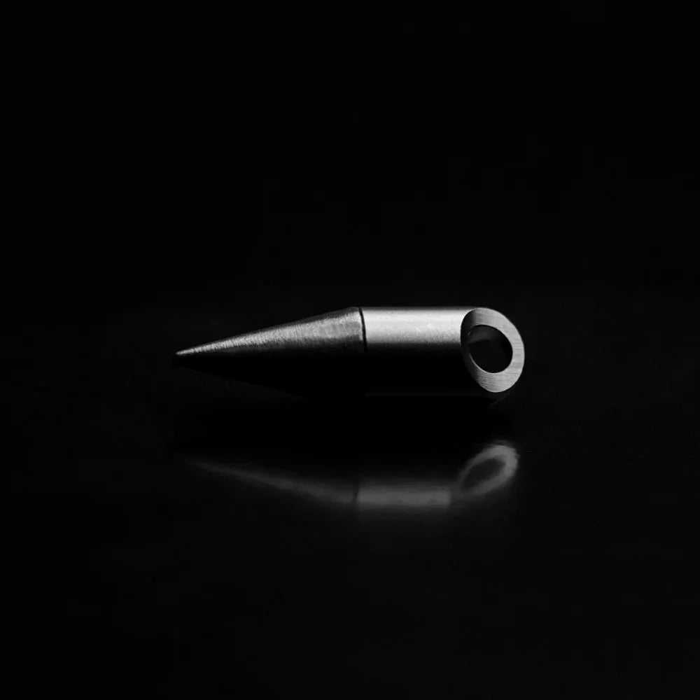 Minimalist metal everyday carry accessory on black background, Gear Carry compact design