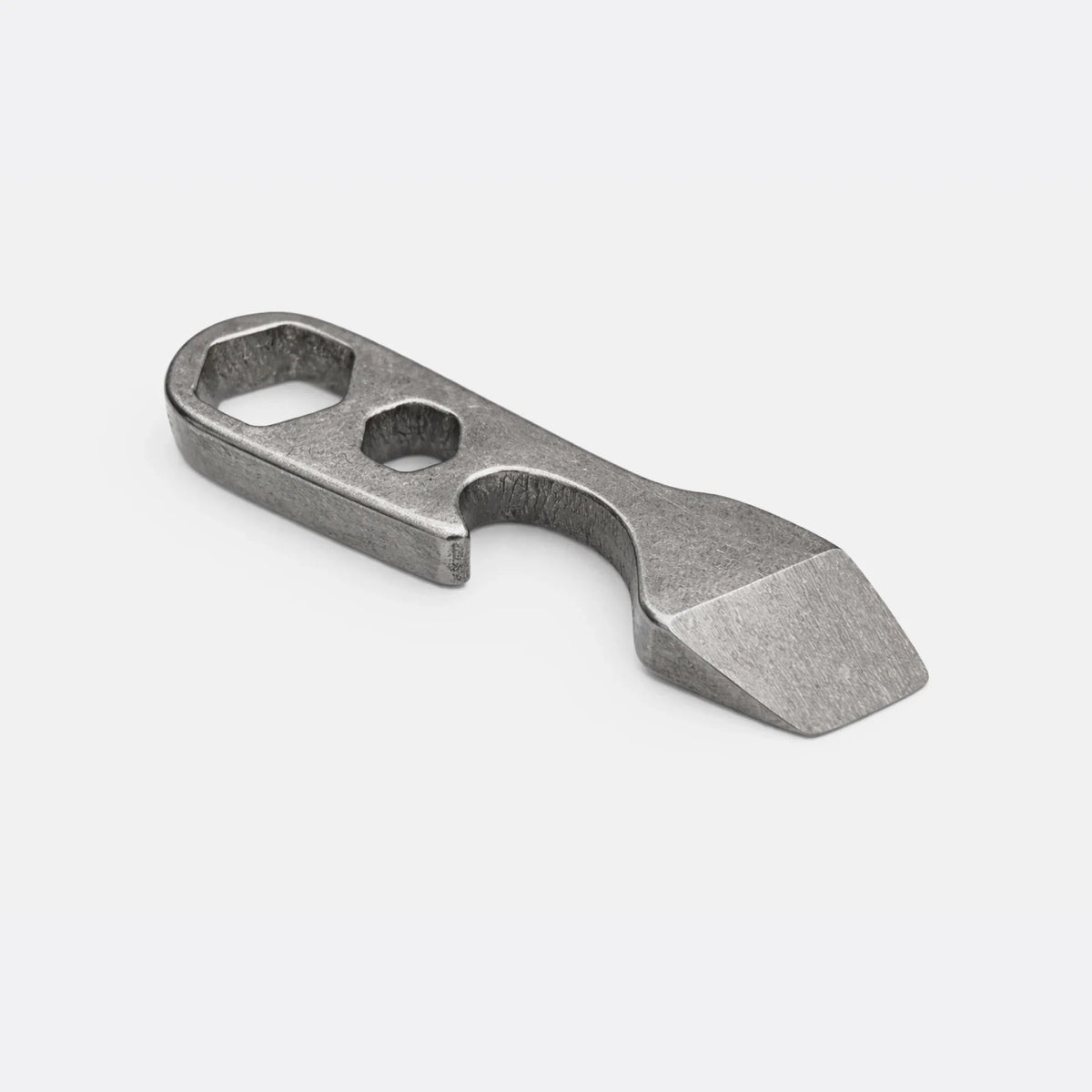 Compact metal multi-tool pry bar with hex wrenches by Gear Carry, on white background.